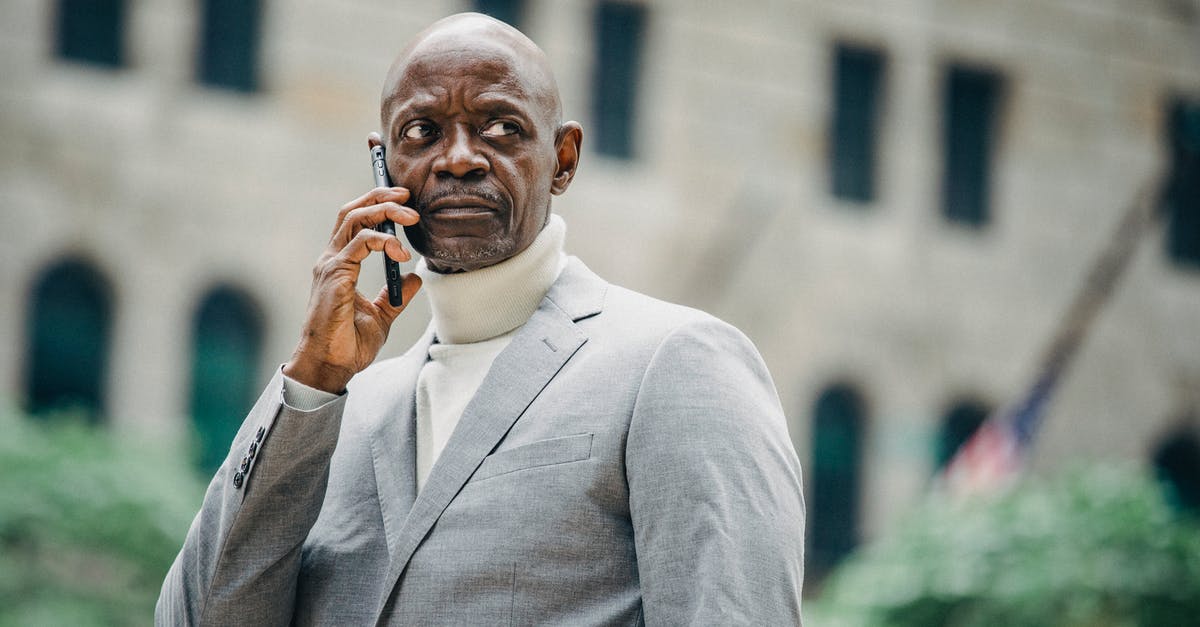 Do Schengen visa authorities phone employers to verify employment? My boss received a call but the caller didn't identify himself - Serious black businessman talking on smartphone on street Do Schengen visa authorities phone employers to verify employment? My boss received a call but the caller didn't identify himself - Serious black businessman talking on smartphone on street