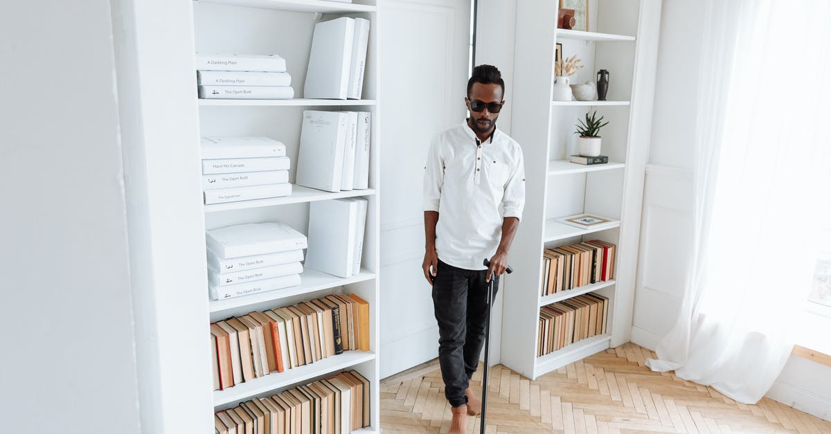 Do South African citizens require a visa for a 15-hour layover in Abu Dhabi? - Man in White Dress Shirt and Black Pants Standing on Brown Wooden Floor Do South African citizens require a visa for a 15-hour layover in Abu Dhabi? - Man in White Dress Shirt and Black Pants Standing on Brown Wooden Floor