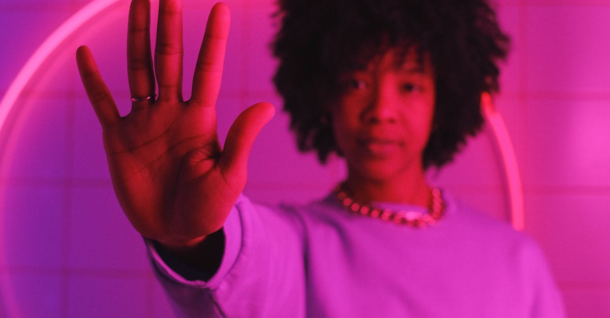Do South Africans require any sort of visa for a 5 hour stop over in Abu Dhabi? - Serious black woman standing with raised arm in room with pink illumination Do South Africans require any sort of visa for a 5 hour stop over in Abu Dhabi? - Serious black woman standing with raised arm in room with pink illumination