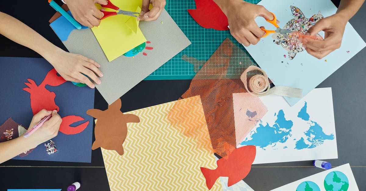 Do we need to create separate accounts for our children to apply for a UK visit visa? - Top view of group of crop anonymous children sitting at table and creating colorful draft and artworks with paper and scissors Do we need to create separate accounts for our children to apply for a UK visit visa? - Top view of group of crop anonymous children sitting at table and creating colorful draft and artworks with paper and scissors