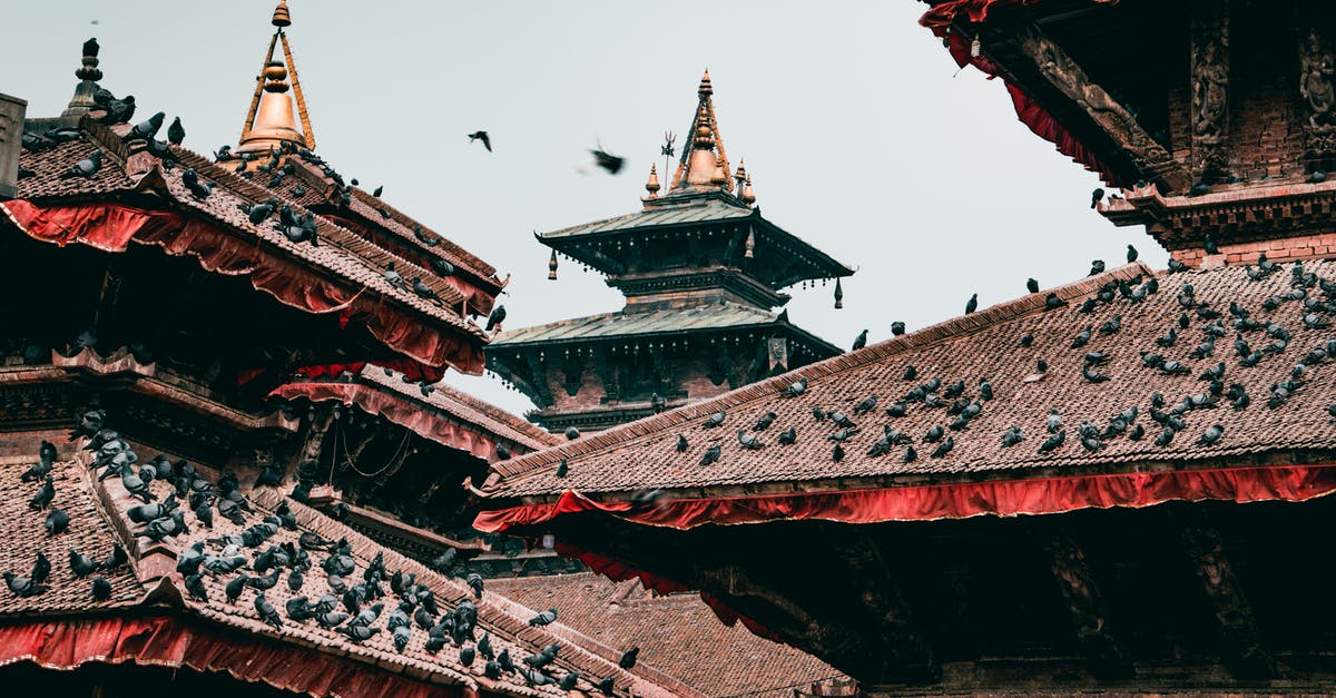 Documents required by Indian citizens wishing to travel to Nepal - A Man Standing on a Rocky Mountain Documents required by Indian citizens wishing to travel to Nepal - A Man Standing on a Rocky Mountain