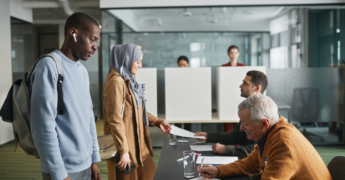 Documents required for a Mexican citizen getting married to a Pakistani in Dubai? - A Man Getting Papers to a Person Documents required for a Mexican citizen getting married to a Pakistani in Dubai? - A Man Getting Papers to a Person