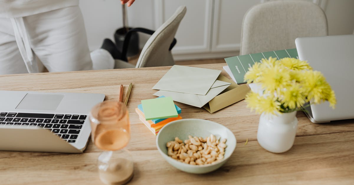 Documents to submit for UK visit visa reapplication - Snack and Documents on Desk Documents to submit for UK visit visa reapplication - Snack and Documents on Desk