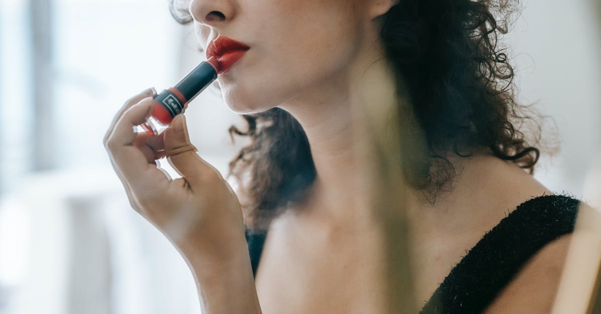 Does 24-hour grace period apply after paid changes to airline reservations? - Content young woman applying red lipstick on lips Does 24-hour grace period apply after paid changes to airline reservations? - Content young woman applying red lipstick on lips