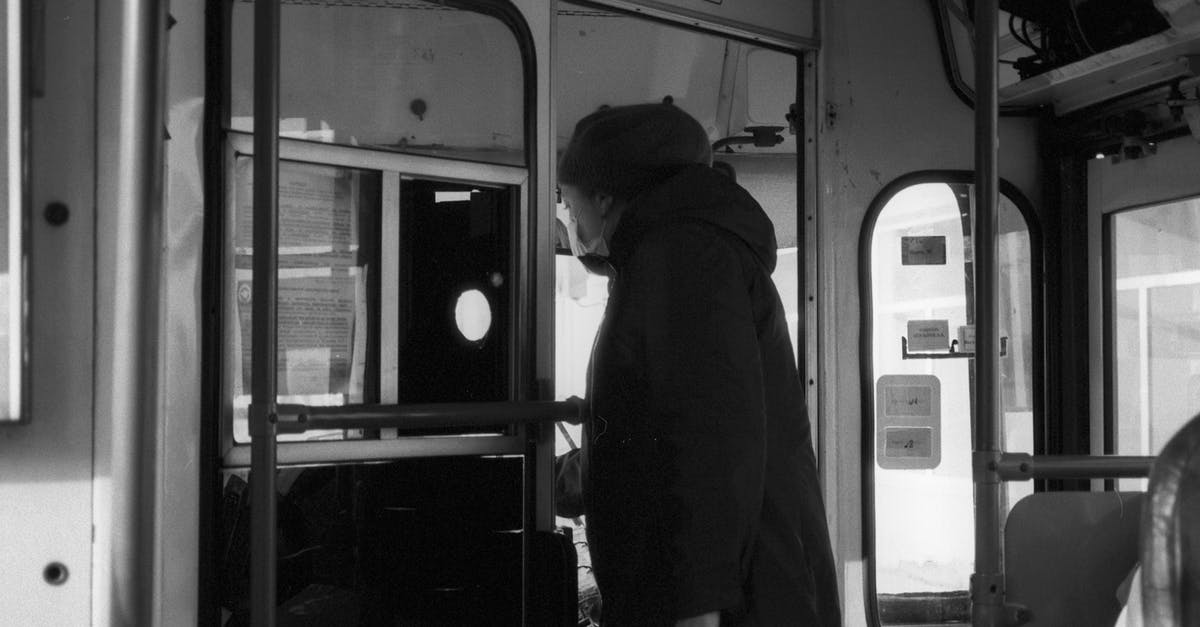 Does a same-day return ticket count as a "through ticket to some other country"? - Man in Black Jacket Sitting on Train Seat Does a same-day return ticket count as a "through ticket to some other country"? - Man in Black Jacket Sitting on Train Seat