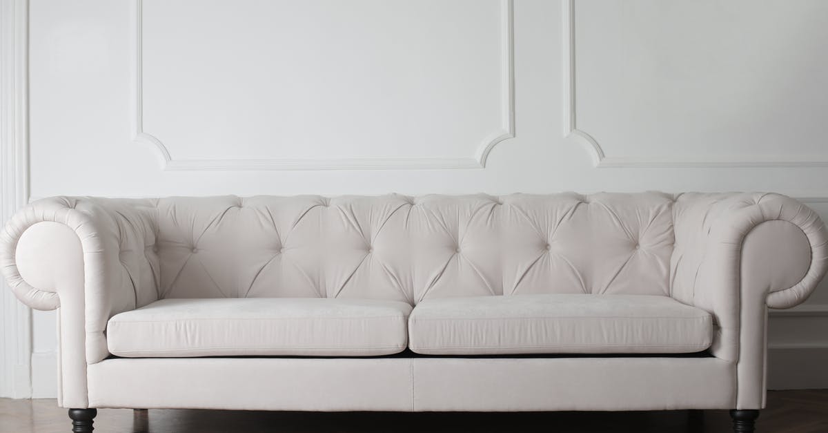 Does a seat cushion help for 12+ hour flights? - Photo Of White Couch On Wooden Floor Does a seat cushion help for 12+ hour flights? - Photo Of White Couch On Wooden Floor