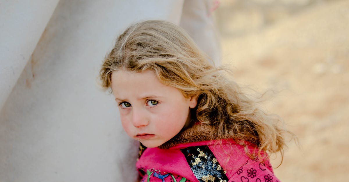 Does an Indian need a visa to visit the Schengen area as a tourist? - Unhappy little girl looking at camera while standing near weathered shelter in poor refugee camp on blurred background of countryside Does an Indian need a visa to visit the Schengen area as a tourist? - Unhappy little girl looking at camera while standing near weathered shelter in poor refugee camp on blurred background of countryside