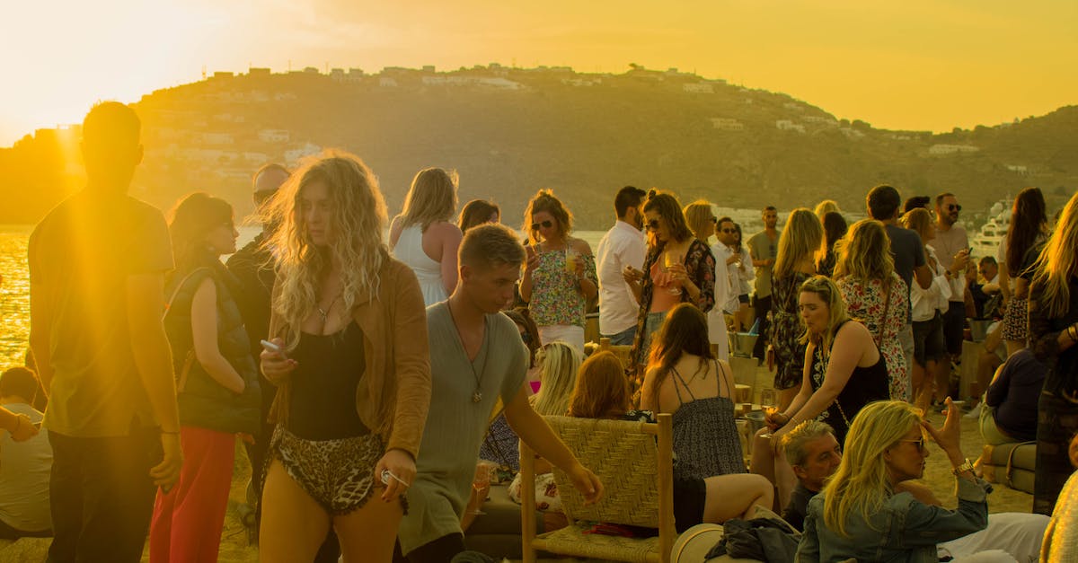 Does anyone have any advice for an English person going to Positivus festival in Salacgriva, Latvia? [closed] - Crowd of People Gathering during Golden Hour