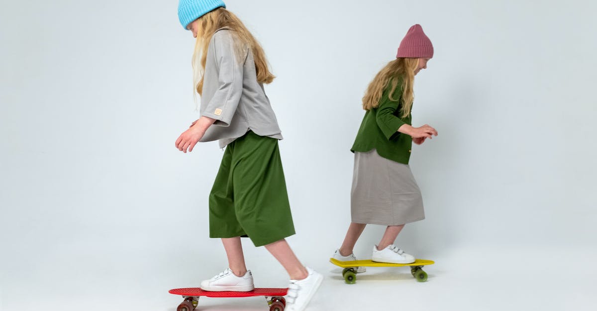 Does anything stop identical twins from traveling on each other's passports? - 2 Women in Green Dress Standing on Red and White Skateboard Does anything stop identical twins from traveling on each other's passports? - 2 Women in Green Dress Standing on Red and White Skateboard