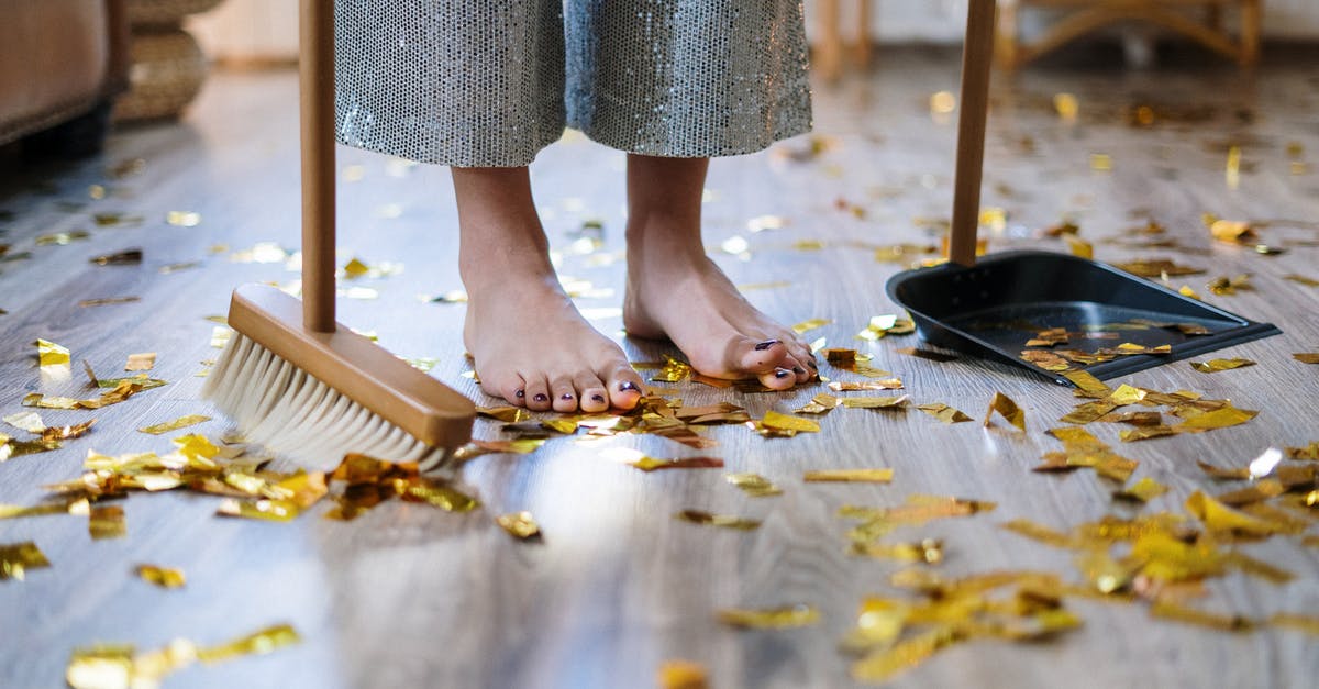 Does declining housekeeping deny housekeepers of their income? - Woman in Gray Dress Standing on Brown Wooden Floor Does declining housekeeping deny housekeepers of their income? - Woman in Gray Dress Standing on Brown Wooden Floor