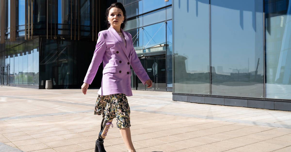 Does EnterAir allow boarding of disabled person with walking sticks? - A Woman Wearing Violet Coat While Walking Does EnterAir allow boarding of disabled person with walking sticks? - A Woman Wearing Violet Coat While Walking