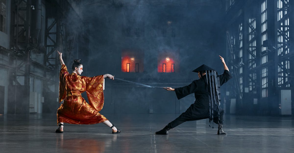 Does female sword fighting as entertainment still exist in Japan? - Man and Woman in Their Game Character Costumes Does female sword fighting as entertainment still exist in Japan? - Man and Woman in Their Game Character Costumes