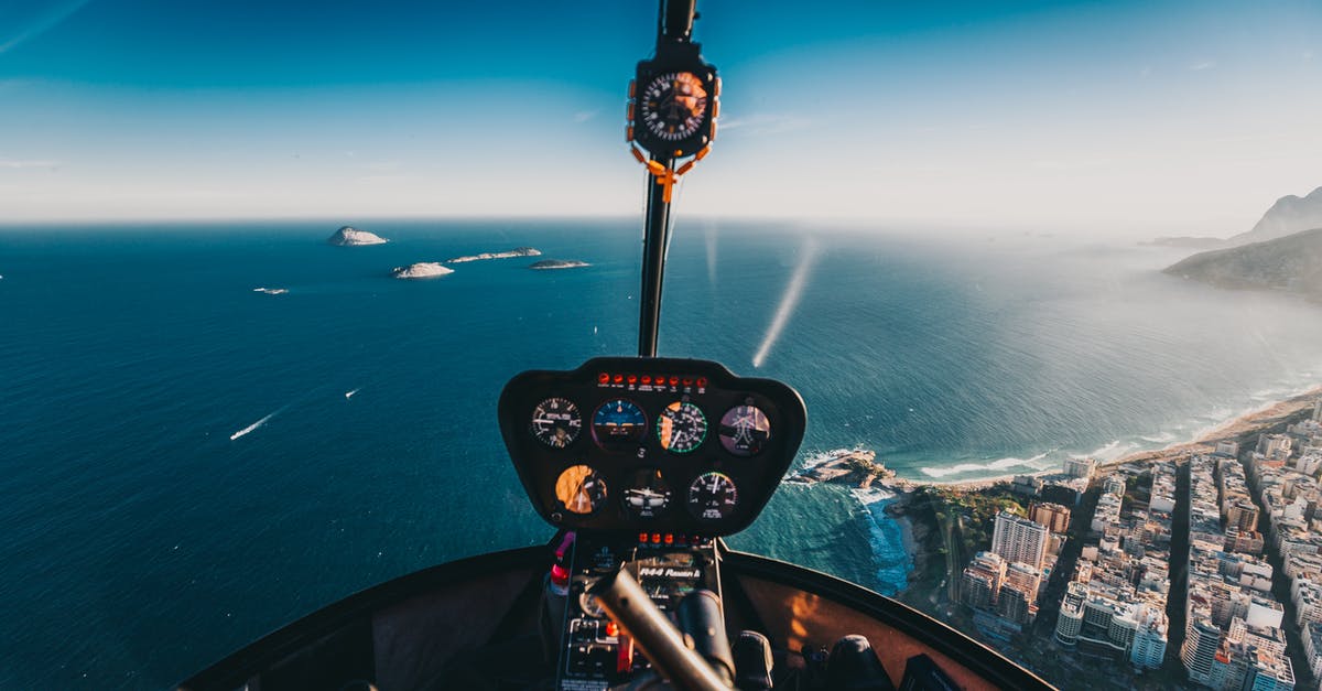 Does flying to the Cayman Islands reset the VWP clock? - Person Flying a Helicopter