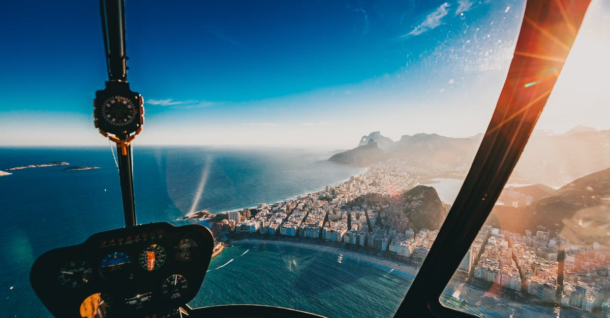 Does flying to the Cayman Islands reset the VWP clock? - Aerial View of Coastal Area from Aircraft