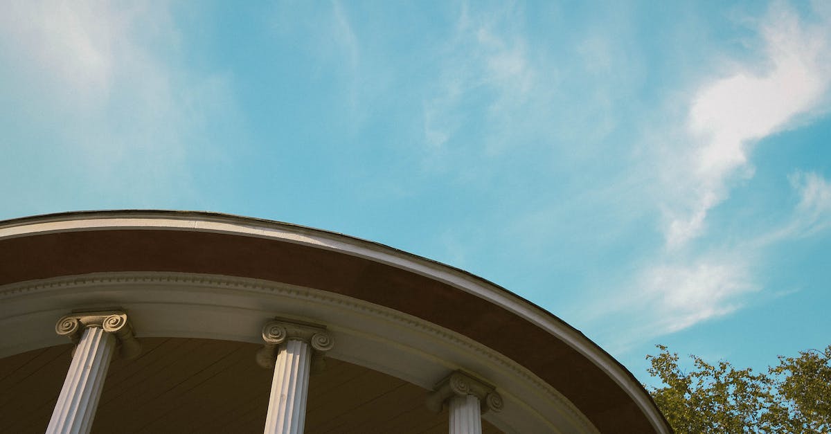 Does Georgia (the country) have a museum or sculpture park of Soviet/Communist/Socialist art? - White and Brown Concrete Building Does Georgia (the country) have a museum or sculpture park of Soviet/Communist/Socialist art? - White and Brown Concrete Building