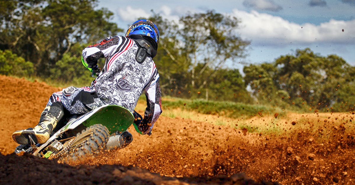 Does Icelandair Saga Premium have access to Fast Track at Stockholm Arlanda airport? - Man Riding Motocross Dirt Bike on Track