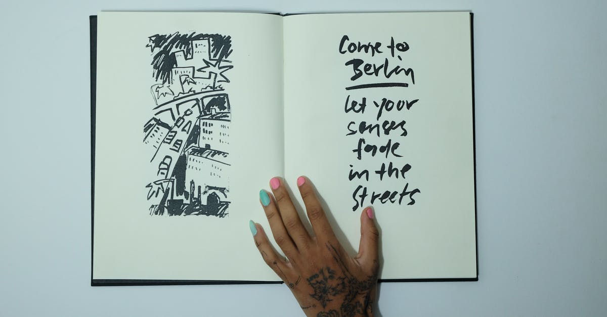 Does it make sense to come to Miami at the beginning of October? [closed] - Unrecognizable woman with opened sketchbook with inscription and drawing
