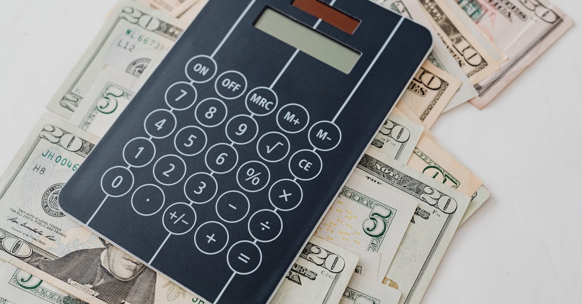 Does my proof of funds for my UK visa need to be in a proper savings account? Can it be in a second checking account? - Close-Up Photo of Banknotes Under a Calculator Does my proof of funds for my UK visa need to be in a proper savings account? Can it be in a second checking account? - Close-Up Photo of Banknotes Under a Calculator