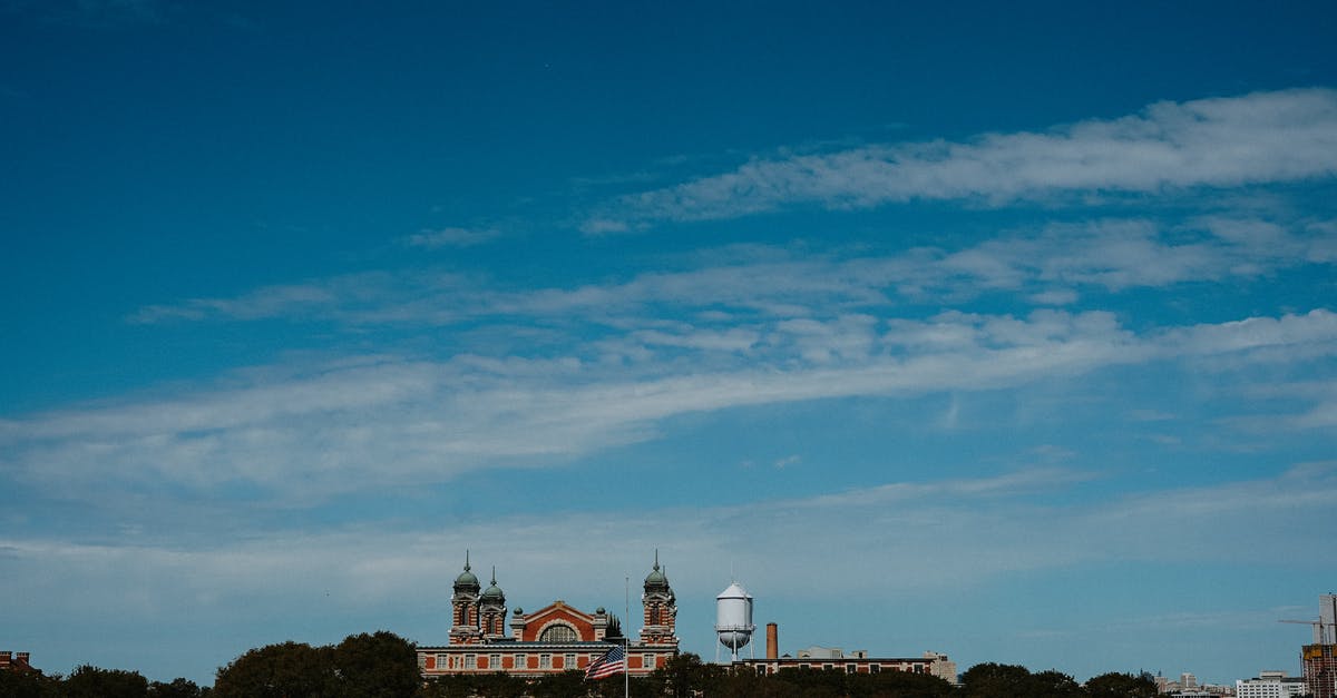 Does New York Pass entitle you to visit Ellis Island from NJ, USA? - Red and Brown Concrete Building Under the Blue Sky Does New York Pass entitle you to visit Ellis Island from NJ, USA? - Red and Brown Concrete Building Under the Blue Sky