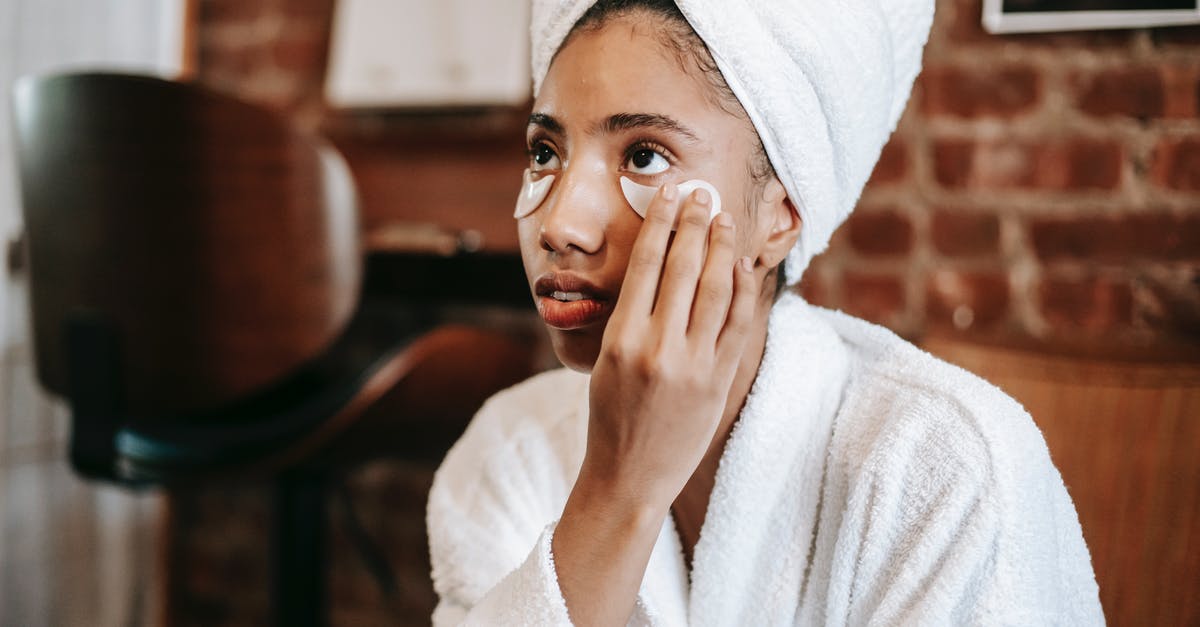 Does Nexus renewal grace period apply to enter Canada? - Young African American female with towel on head applying eye patches on face while looking away Does Nexus renewal grace period apply to enter Canada? - Young African American female with towel on head applying eye patches on face while looking away