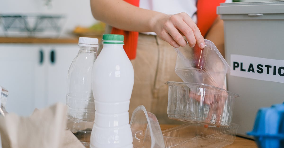 Does Romania put visa refusal stamps? - Woman sorting out plastic wastes at home Does Romania put visa refusal stamps? - Woman sorting out plastic wastes at home