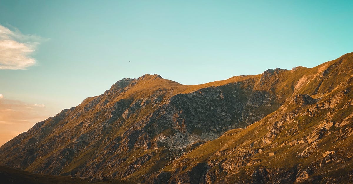 Does Romania put visa refusal stamps? - A Mountain Landscape under a Clear Blue Sky Does Romania put visa refusal stamps? - A Mountain Landscape under a Clear Blue Sky