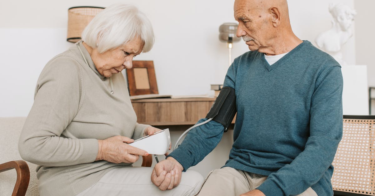 Does SENTRI include TSA Pre-Check for Non-US citizens? - Woman Checking Blood Pressure of a Man Does SENTRI include TSA Pre-Check for Non-US citizens? - Woman Checking Blood Pressure of a Man
