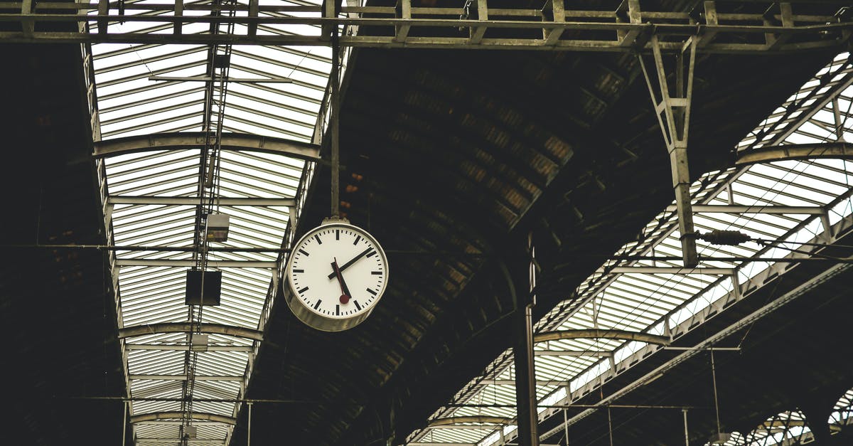 Does Siesta time in Panama affect business travelers? - Low Angle View of Clock at Railroad Station Does Siesta time in Panama affect business travelers? - Low Angle View of Clock at Railroad Station