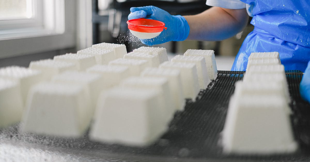 Does starting a working visa in Canada reset my ESTA? [closed] - Close Up of Person Working in Cheese Factory
