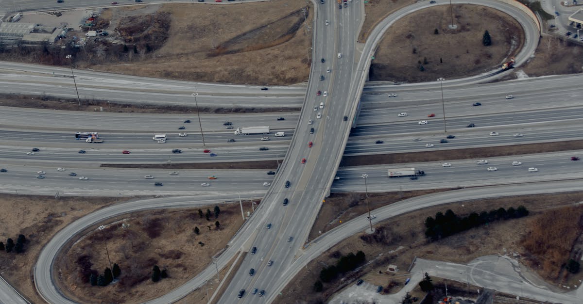 Does the chinese 72-hour transit visa allow to cross a land border? - Cars driving on asphalt winding road of freeway Does the chinese 72-hour transit visa allow to cross a land border? - Cars driving on asphalt winding road of freeway