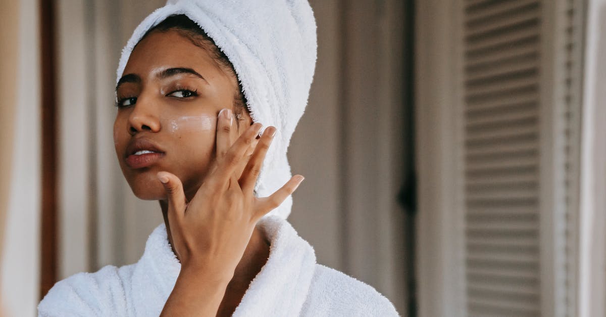 Does the DB corona-flexibility rule apply to Dutch domestic connections on international journeys? - Young ethnic female in robe with terry towel on head applying moisturizing cream on face while looking in mirror in house Does the DB corona-flexibility rule apply to Dutch domestic connections on international journeys? - Young ethnic female in robe with terry towel on head applying moisturizing cream on face while looking in mirror in house
