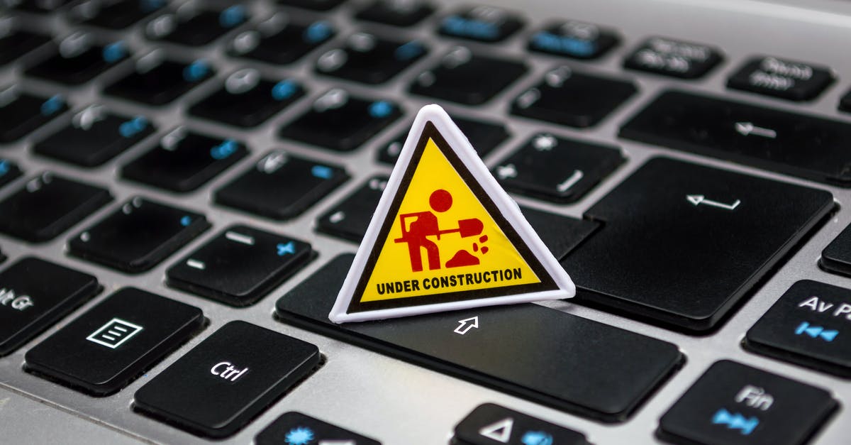 Does the duty free laptop come under 25K entitlement? (India customs) [duplicate] - Under Construction Signage on Laptop Keyboard