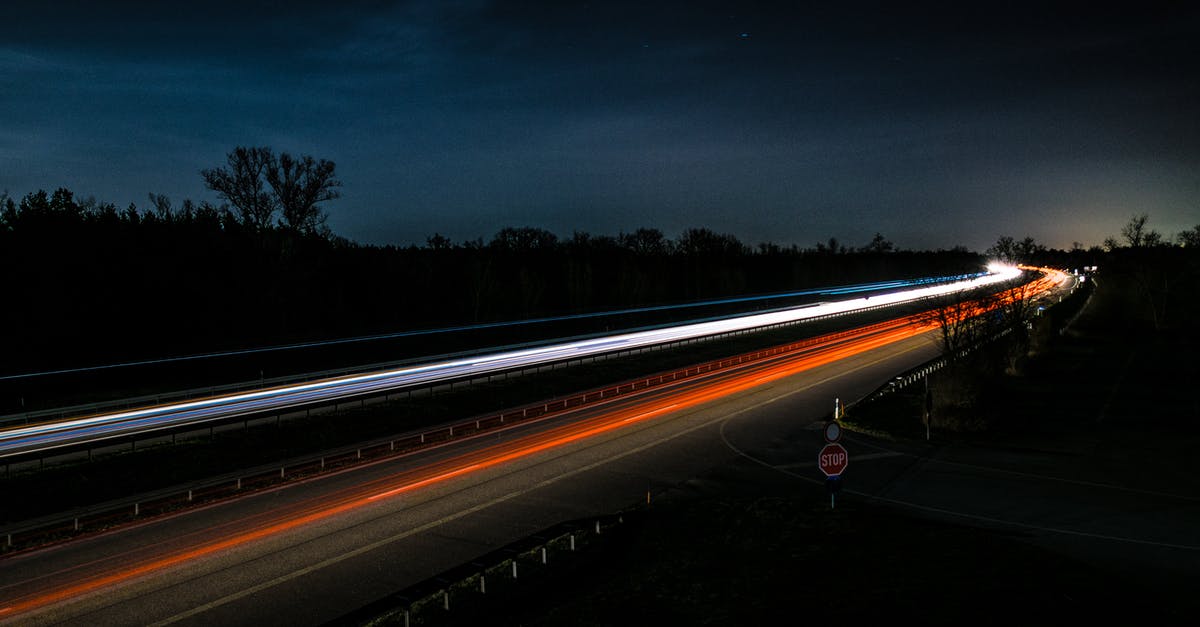Does the introduction of paid fast lane as replacement of the carpool lane increase or decrease the traffic speed? [closed] - Time-lapse Photography of Red and White Car Lights on Road during Nighttime