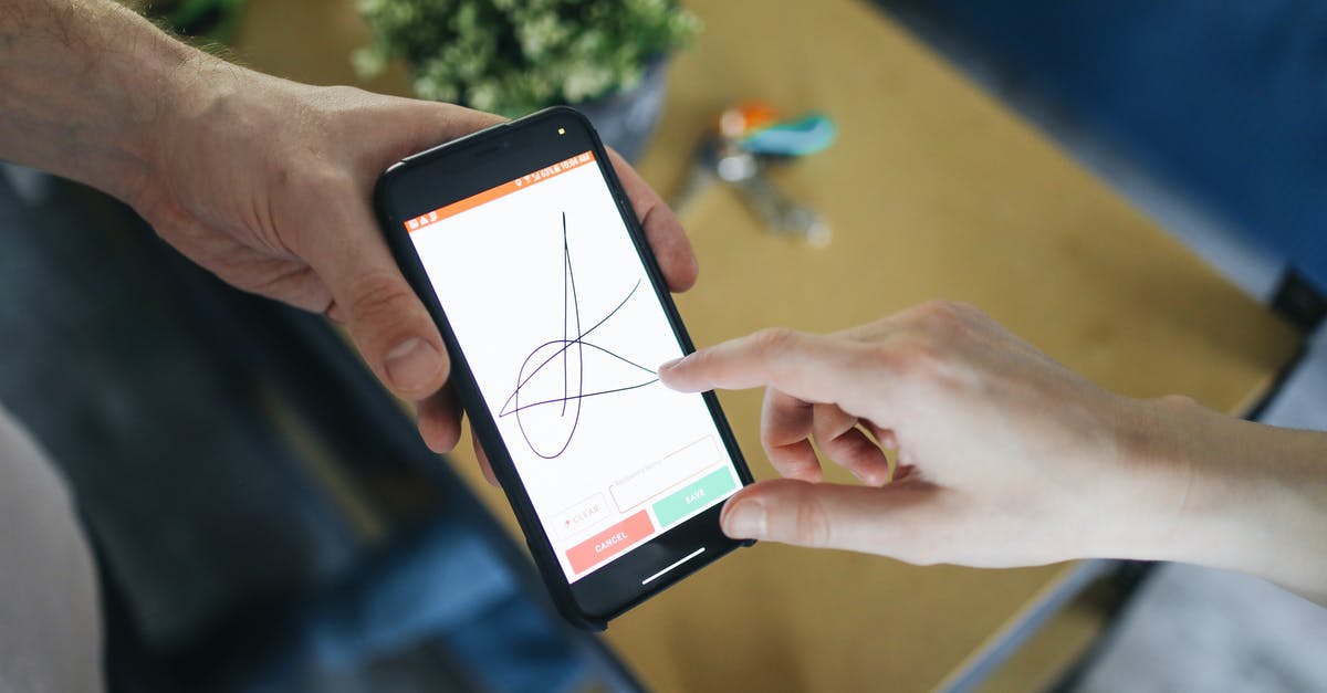 Does the size of the signature on the passport matter? - Person Holding Black Android Smartphone Does the size of the signature on the passport matter? - Person Holding Black Android Smartphone