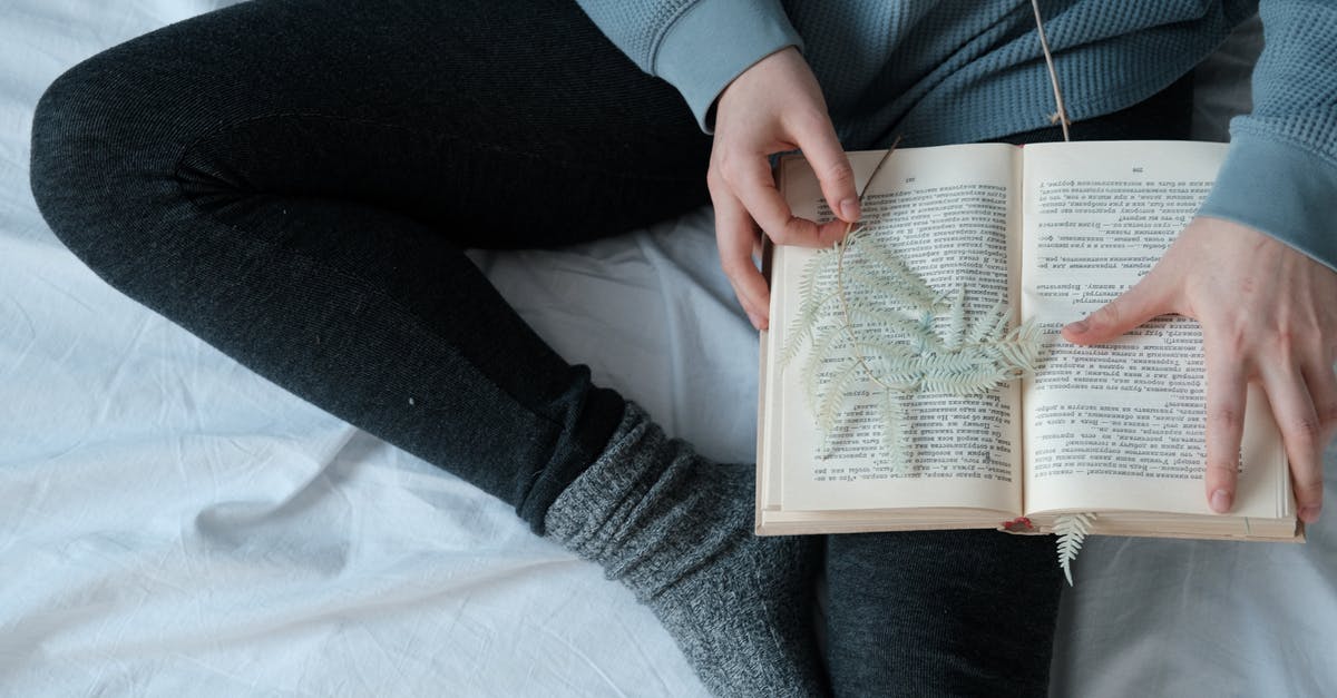 Does the Swiss Family Pass work for siblings? - Person in Blue Sweater Reading Book Does the Swiss Family Pass work for siblings? - Person in Blue Sweater Reading Book