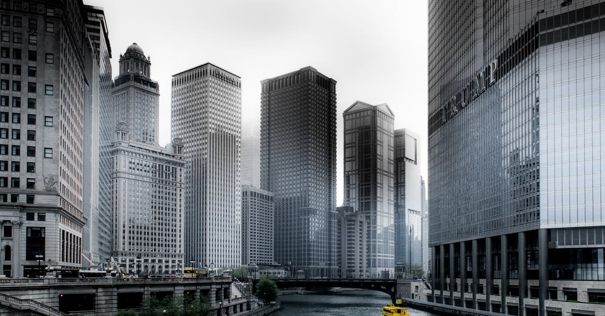 Does the Trump travel ban affect pending visa applications? - Photo of Boat Going Through River in Between Highrise Buildings Does the Trump travel ban affect pending visa applications? - Photo of Boat Going Through River in Between Highrise Buildings