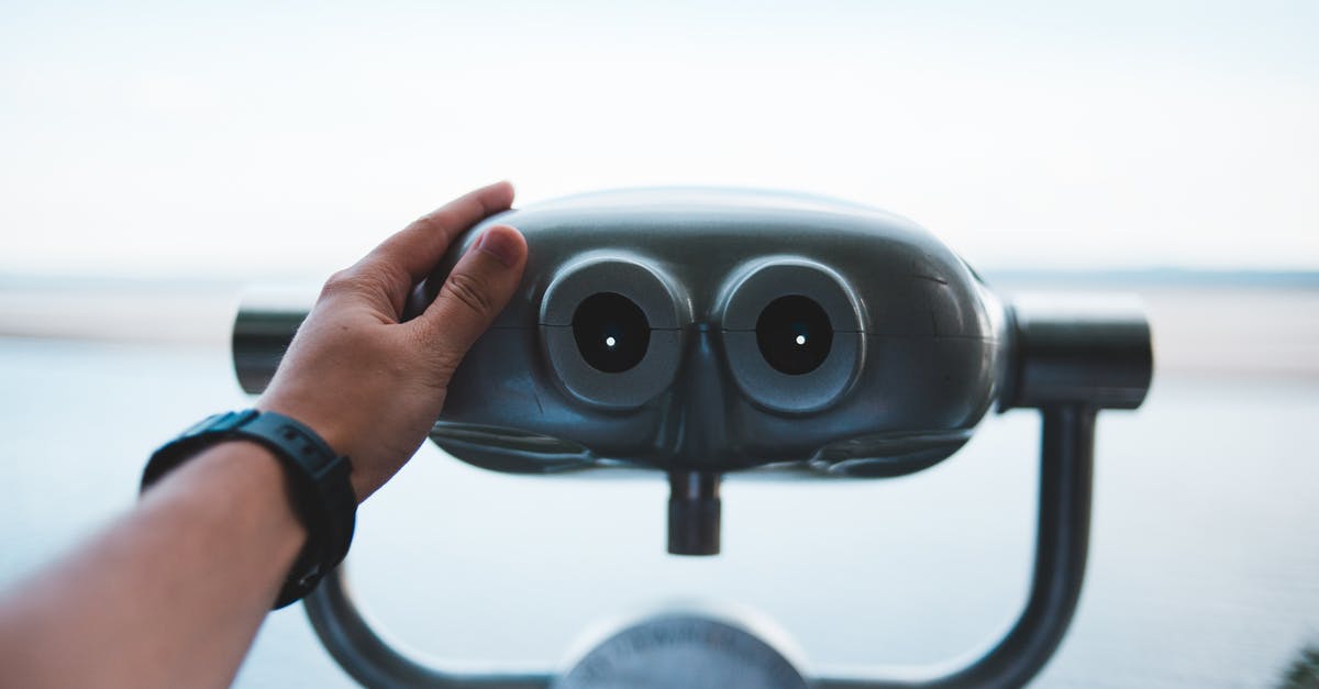 Does Turkish Airlines refund round trip after going the first half? - Crop tourist near binoculars and river during trip Does Turkish Airlines refund round trip after going the first half? - Crop tourist near binoculars and river during trip