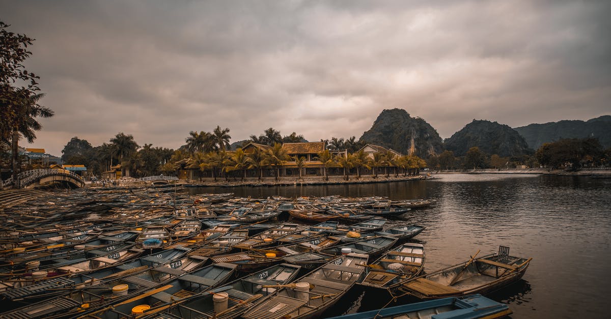 Does Vietnam allow concurrent passports? - Boat on Water Near Green Trees Does Vietnam allow concurrent passports? - Boat on Water Near Green Trees