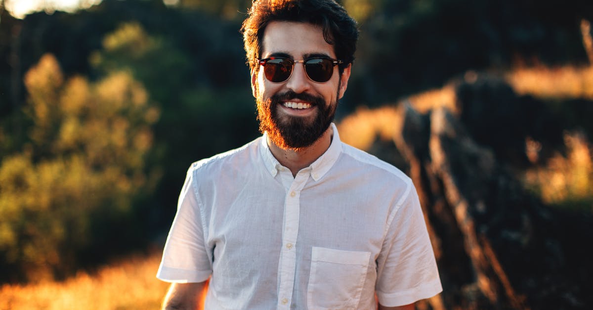 Does wearing imperial beard in the UK attract any ire of general public? - Photo of Man Wearing Sunglasses