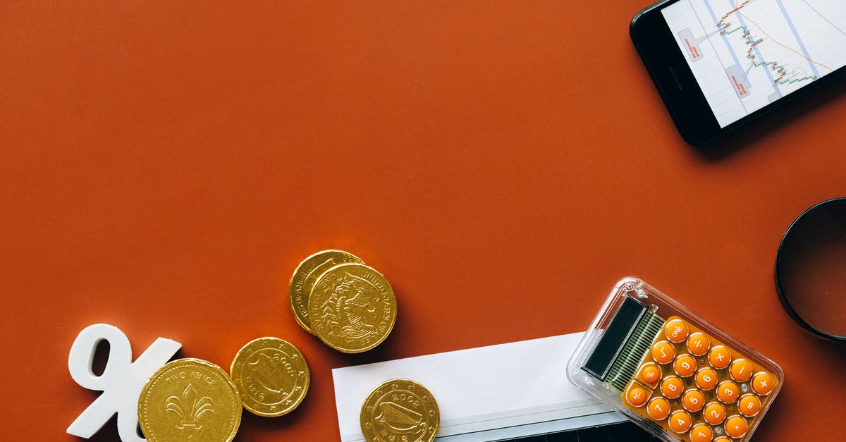 Donating unwanted foreign coins in Sydney - Gold Round Coins on Brown Wooden Table Donating unwanted foreign coins in Sydney - Gold Round Coins on Brown Wooden Table