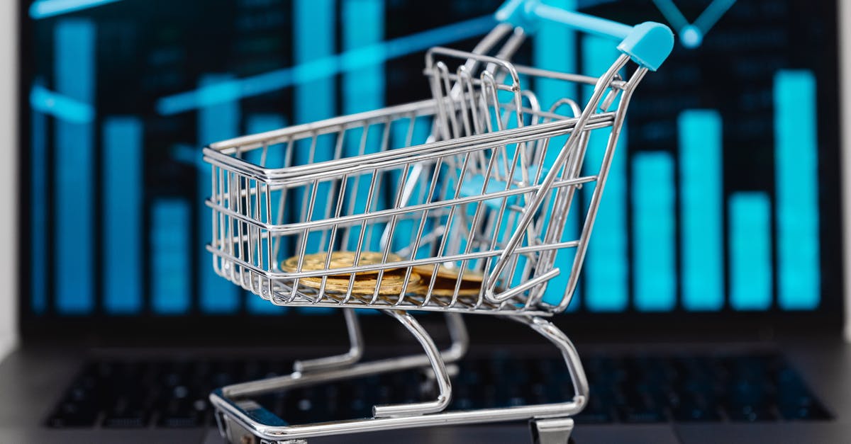 Donating unwanted foreign coins in Sydney - Blue Shopping Cart on White Floor Donating unwanted foreign coins in Sydney - Blue Shopping Cart on White Floor