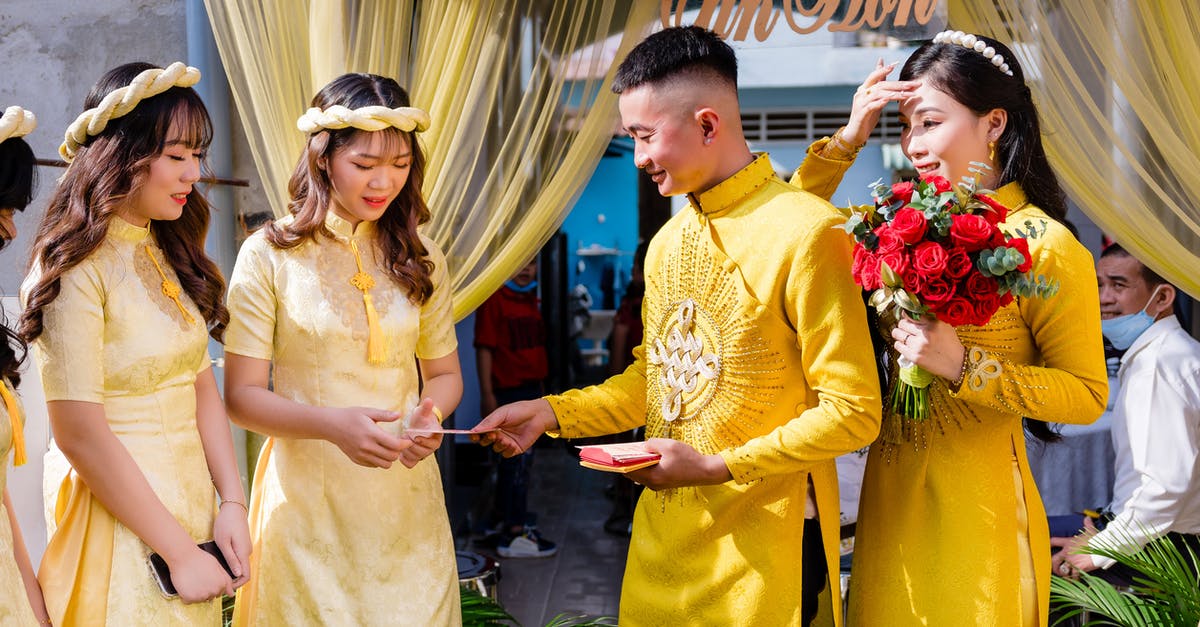 Dos and don'ts at a Vietnamese wedding - Couple in Yellow Ao Dai on Their Wedding Day Dos and don'ts at a Vietnamese wedding - Couple in Yellow Ao Dai on Their Wedding Day