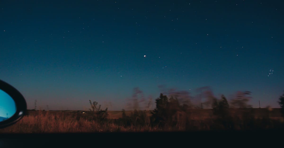 Driving through Croatia: can someone tell me where I took this photo? - View through moving car window of horizon line with dark star sky and blurred trees