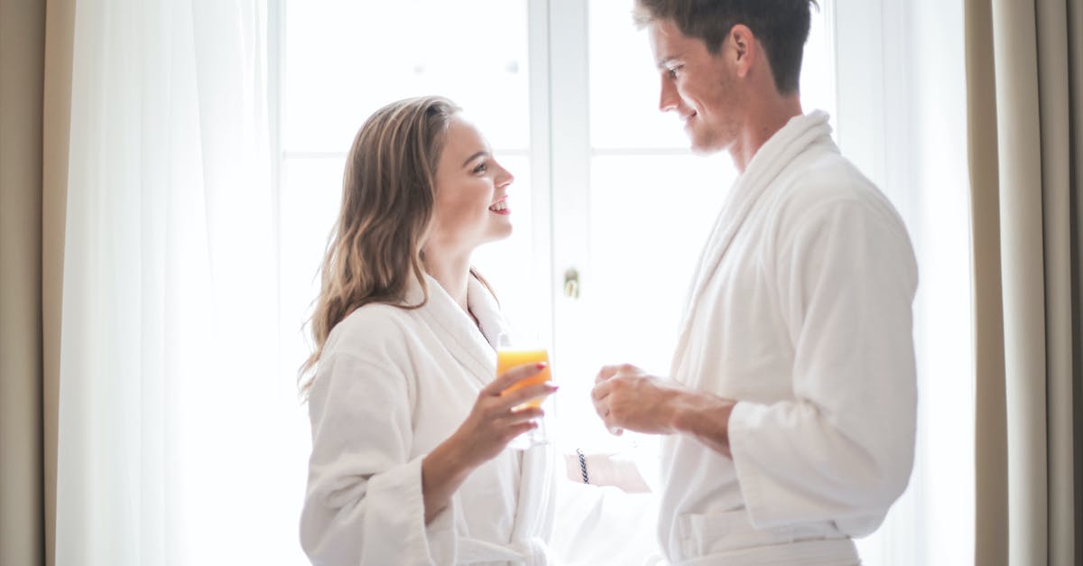 DS-160 - about other family members traveling with me [closed] - Positive couple drinking juice at home