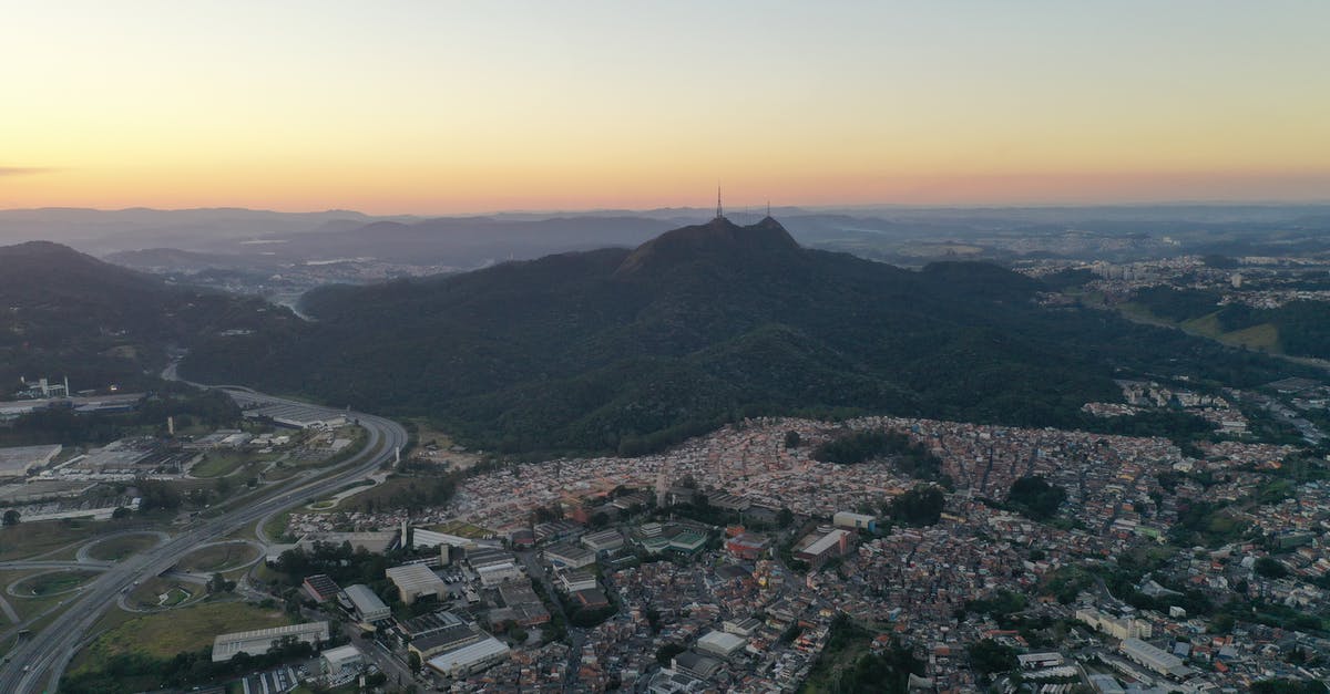 Dutch Residency Visa and Schengen Area Travel (Czech Republic) - Cityscape near mountain terrain in evening Dutch Residency Visa and Schengen Area Travel (Czech Republic) - Cityscape near mountain terrain in evening