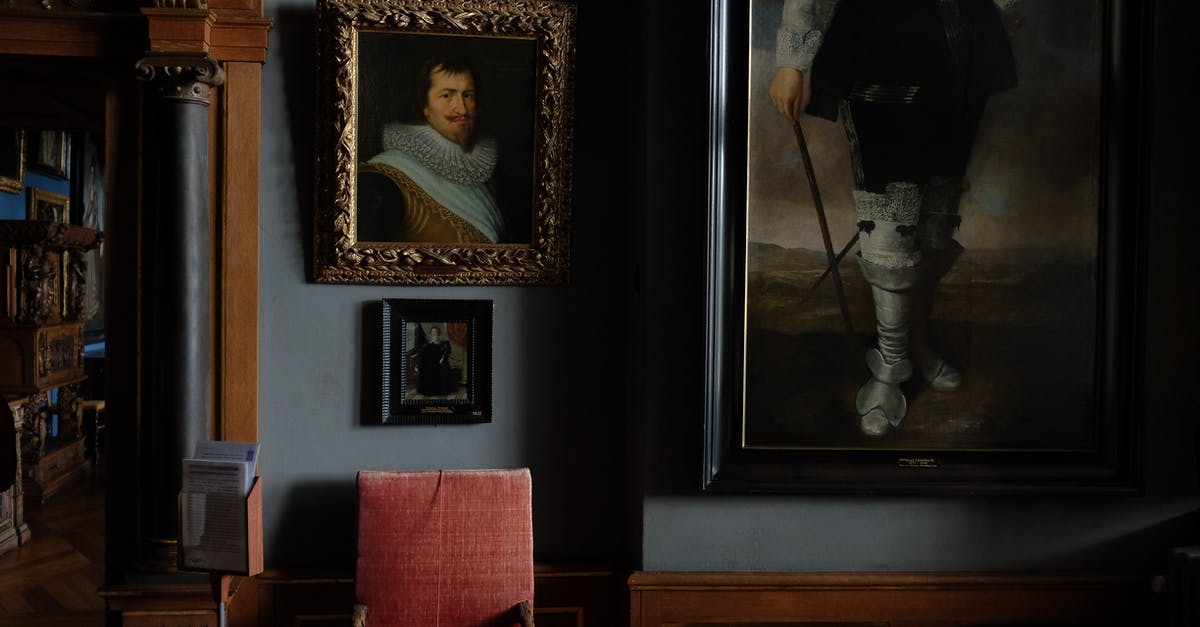 Education history in DS160 - Interior of modern art gallery with portraits in cozy frames hanging on blue wall near comfy old chair Education history in DS160 - Interior of modern art gallery with portraits in cozy frames hanging on blue wall near comfy old chair