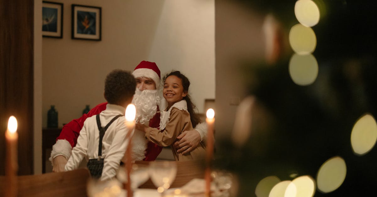 EEA family permit eligibility for the UK - Man and Woman Sitting on Chair in Front of Table With Candles EEA family permit eligibility for the UK - Man and Woman Sitting on Chair in Front of Table With Candles