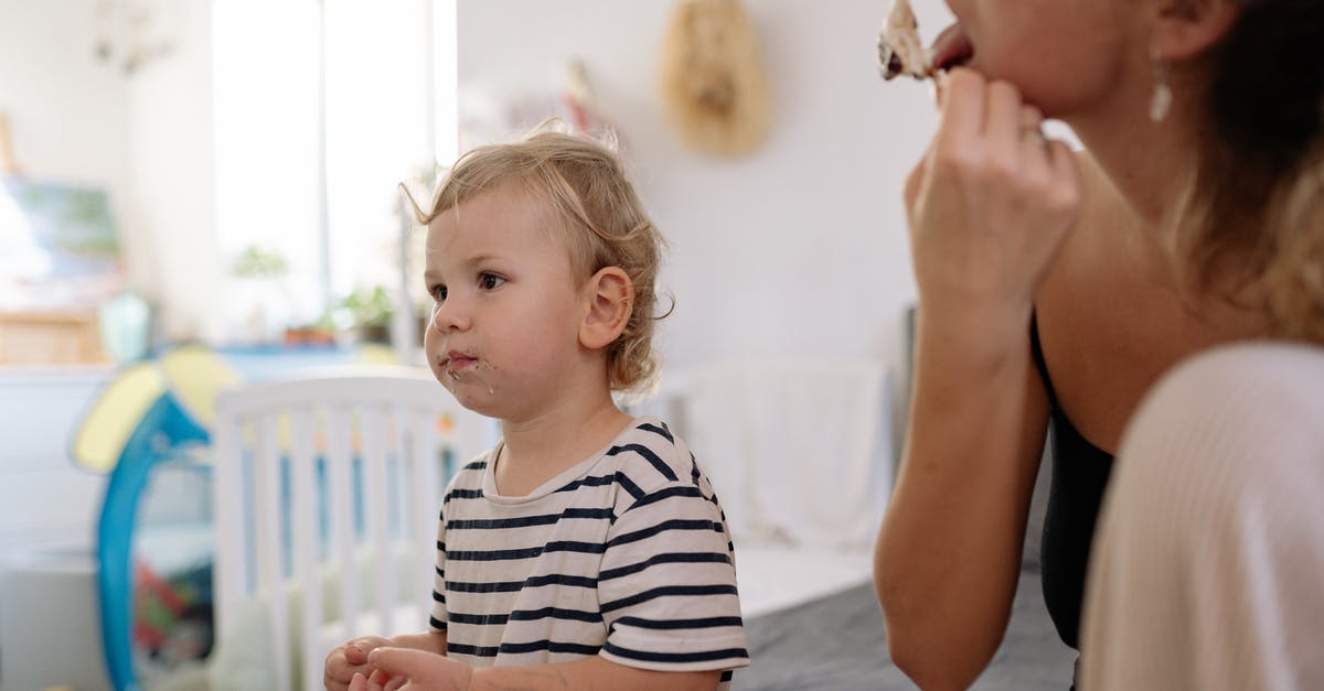 EEA family permit visa - Girl in White and Black Striped Shirt Eating Ice Cream EEA family permit visa - Girl in White and Black Striped Shirt Eating Ice Cream