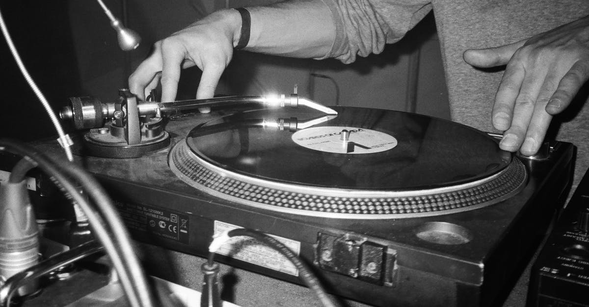 Electronic I94 database records the same entry twice - Grayscale Photography of Person Playing Turntable Electronic I94 database records the same entry twice - Grayscale Photography of Person Playing Turntable
