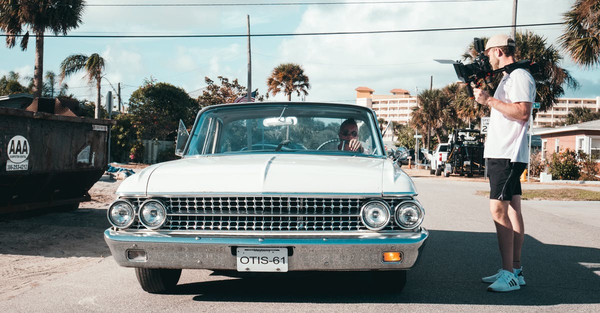 Electronic road tolls (cashless) in Florida - Man Beside Car Electronic road tolls (cashless) in Florida - Man Beside Car